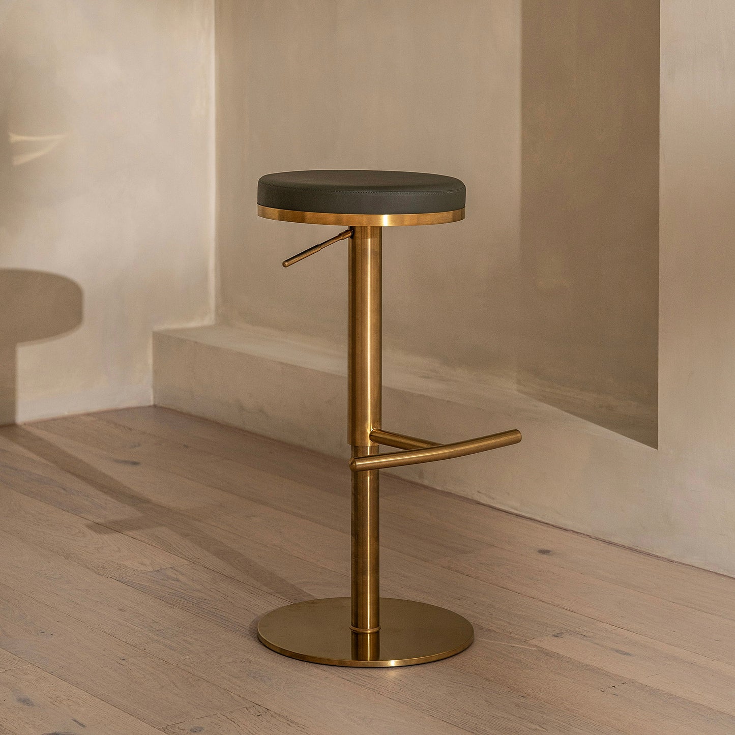Elio Bar Stool | Adjustable | Brass & Dark Green Leather